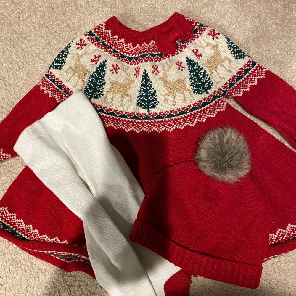 Sweater dress with tights and hat